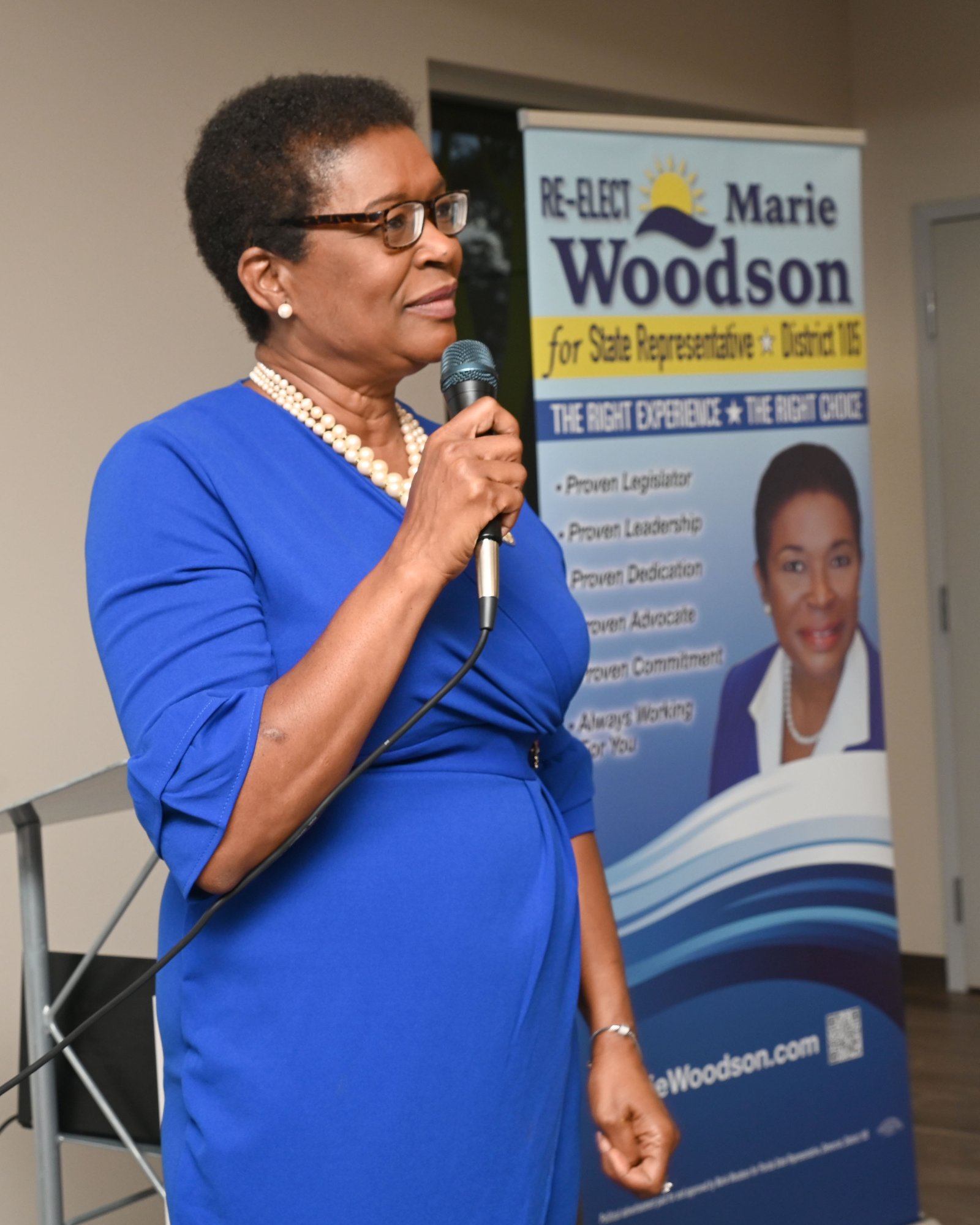 Marie Woodson speaking at a community event